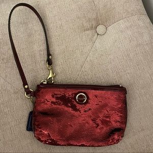 Coach red sequin wristlet